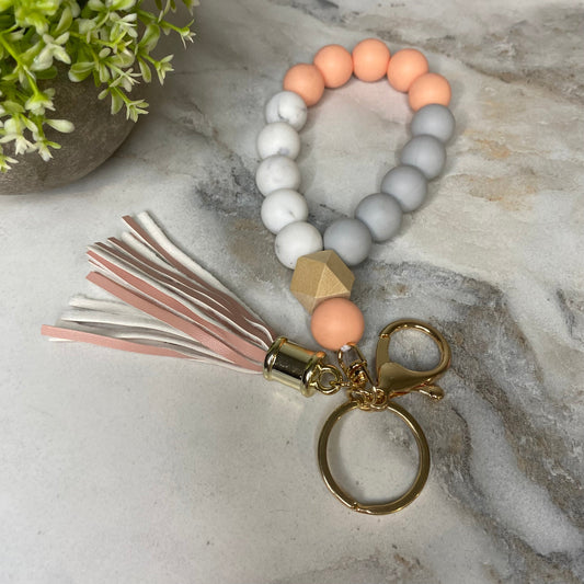 Silicone Bracelet Keychain with Wood Bead & Tassel - Orange Cream